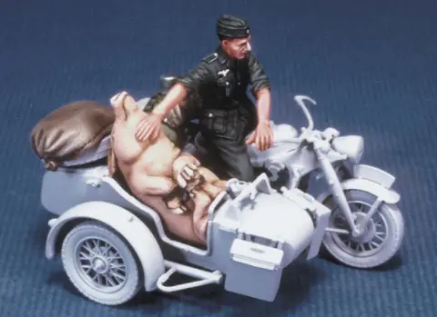 German motorcycle rider with a pig (WWⅡ)
