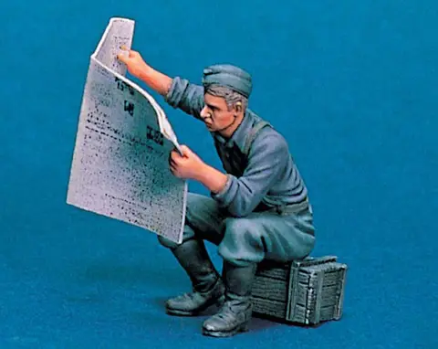 "READING NEWSPAPER"